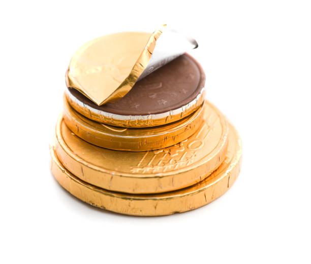 istock The euro currency . Chocolate coins isolated on white background. 1054970492
