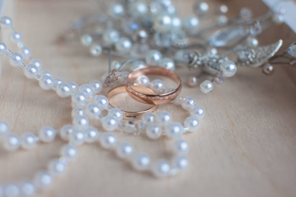 istock gold wedding rings, bijouterie and bridal accessories 1054970562