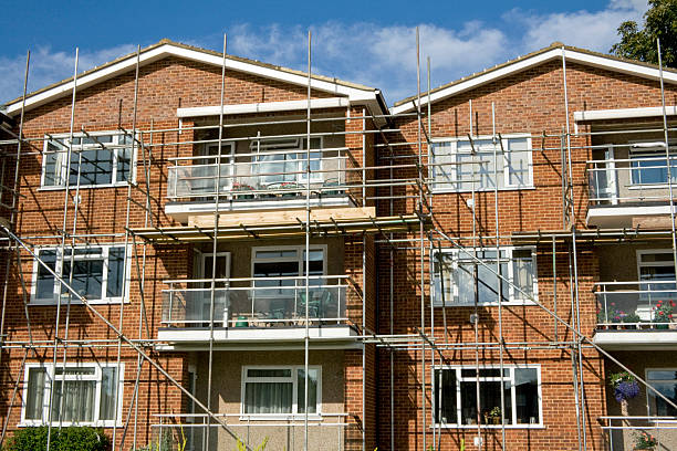 Scaffolding on Houses stock photo