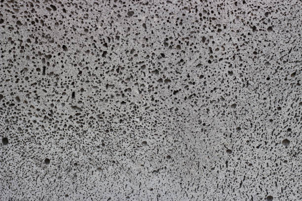 istock Porous gray foam concrete close up, texture, background 1054981324