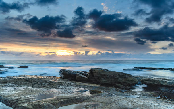istock An Atmospheric Sunrise Seascape 1054984254