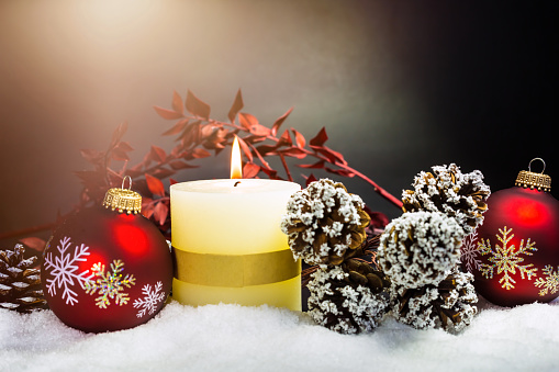 Christmas Candle and Christmas Balls with snow