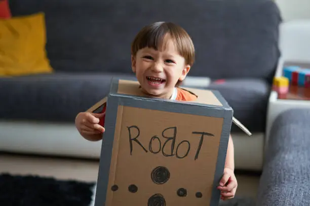 Photo of Cute child is wearing robot costume