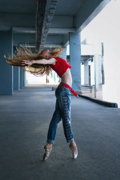 istock Ballerina dancing. Street performance. 1055003078