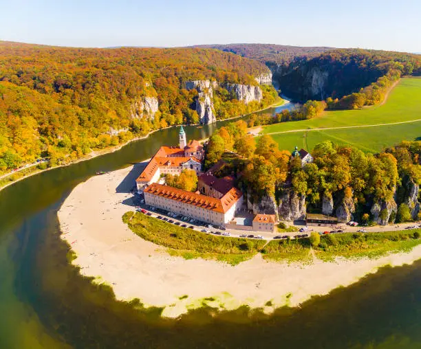 The Danube Gorge - Weltenburg Narrows or Weltenburger Enge. Camera flight over a wonder of nature in Bavaria, Germany. European rivers from above.