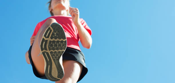 istock Young woman runner running,training for marathon run 1055013454
