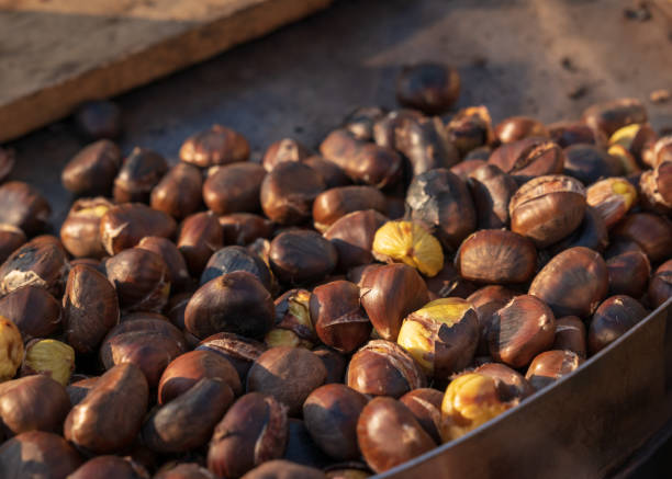 istock Roast chestnuts cooked over the gril 1055013706