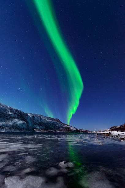istock Aurora Northern Polar light in night sky over Northern Norway 1055014426