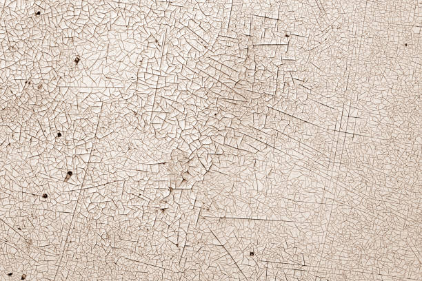 istock Crack and damage on painted texture in brown tone. 1055015324