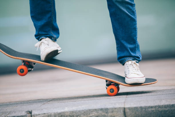 istock Skateboarder skateboarding on  city 1055020454