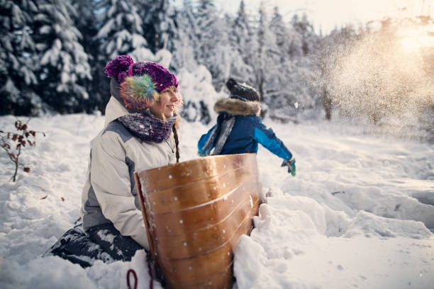 istock Children enjoying snowball fight 1055020558