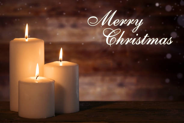 istock Text of Merry Christmas with white candle 1055023806