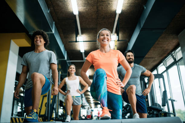 istock Team workout in gym to reach goals 1055027392