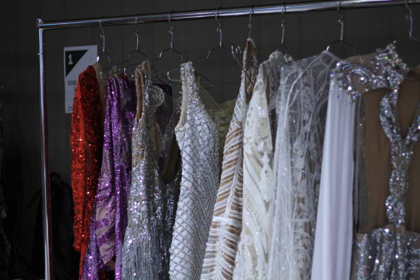 istock Clothes on the hanger behind the stage 1055029302