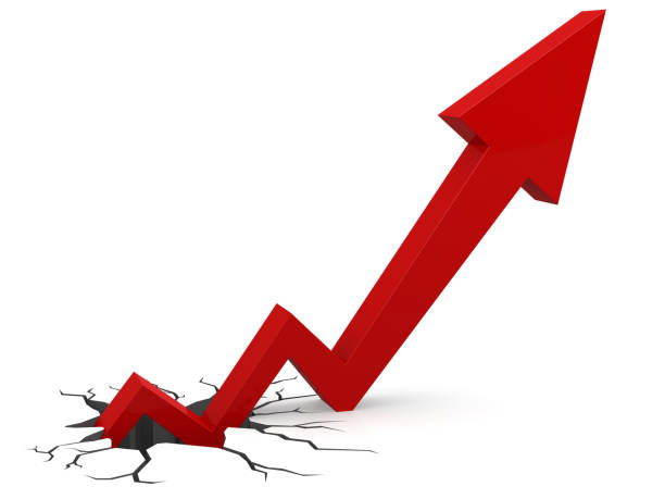 istock Red arrow out of broken ground 1055029418