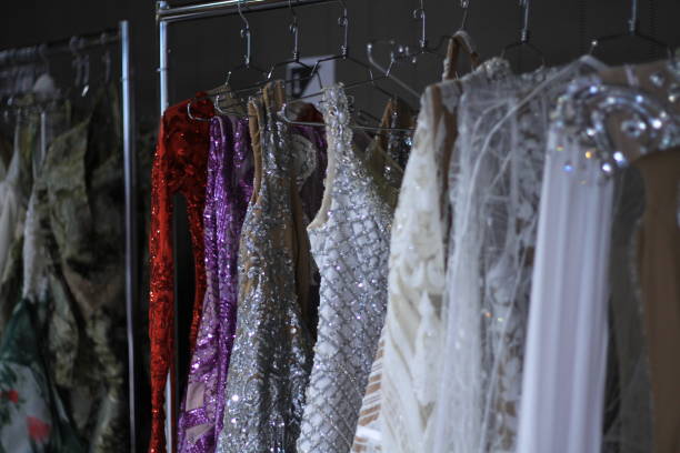istock Clothes on the hanger behind the stage 1055029568