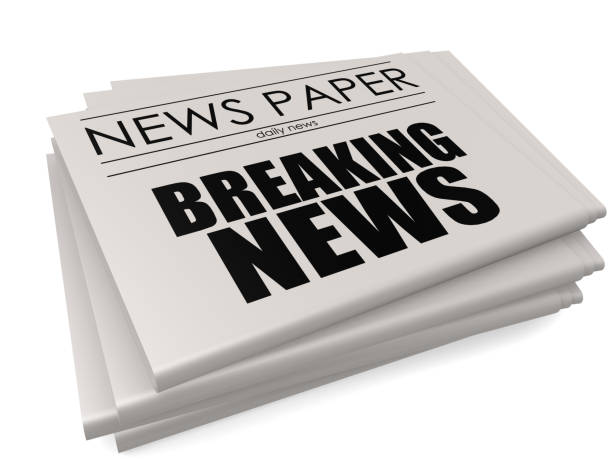 istock Breaking news headline on a mock up newspaper, 1055031612