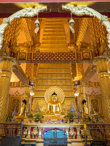 istock Golden Buddha statue in Buddhist temple, Thailand 1055035056