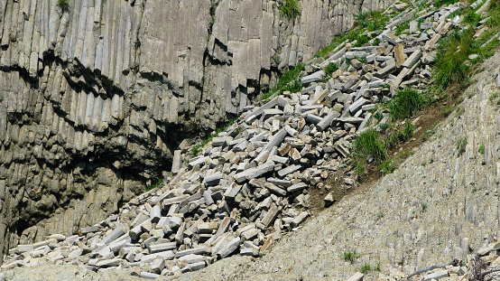 Column basalts formation of Stolbchaty cape at Kunashir at kuril islands, Russia