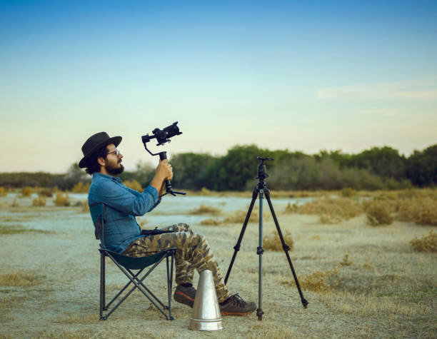 istock Man flying his drone, outdoors 1055053490