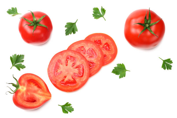 istock slice of tomato with parsley isolated on white background. top view 1055058650