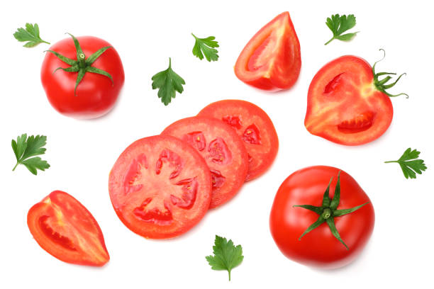 istock slice of tomato with parsley isolated on white background. top view 1055058714