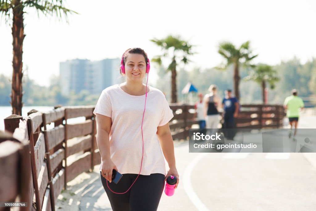 Portrait of young athlete in the city Walking Stock Photo