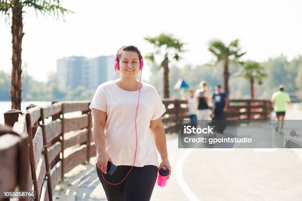 Portrait Of Young Athlete In The City Stock Photo - Download Image Now - Walking, Racewalking, Overweight