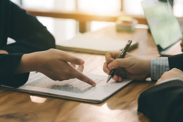 istock Businessman signed a contract agreement to invest together. 1055060244