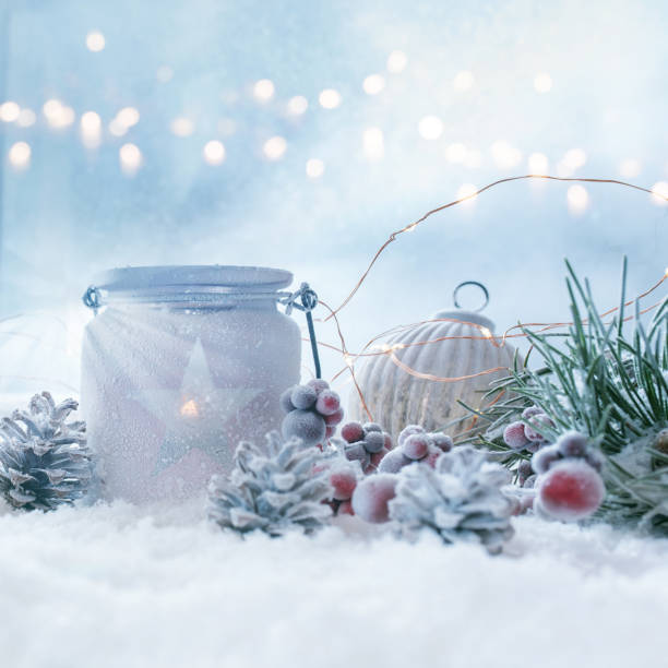 Winter still life in snow and golden bokeh