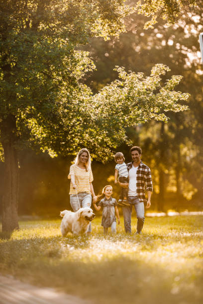 istock Family's spring walk with a dog! 1055060450