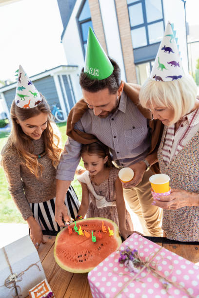 istock Pleased brunette bearded man creating festive atmosphere 1055062670