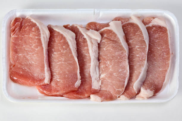 istock Fresh raw pork meat on polysterene plate 1055067810