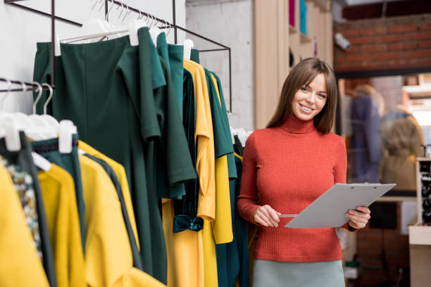 istock Young smiling girl in the store 1055068400