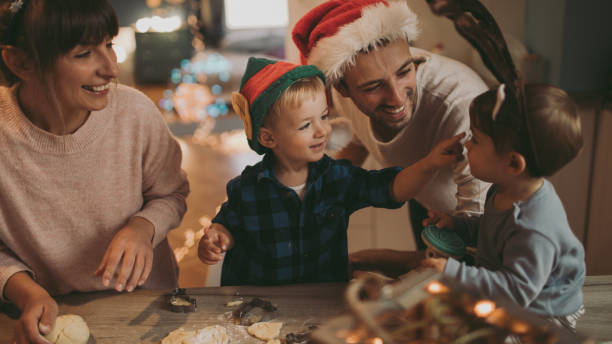 istock Family baking Christmas cookies 1055070416