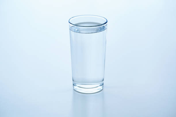 Clear glass of drinking water on a white background