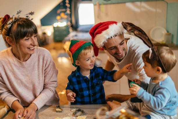istock Family baking Christmas cookies 1055081790