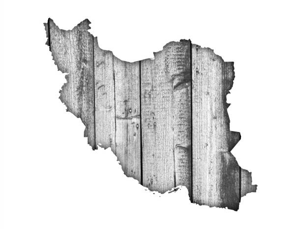 istock Map of Iran on weathered wood 1055084352