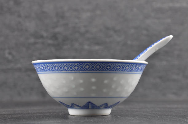 istock Asian dinnerware with cutlery on shale 1055085126
