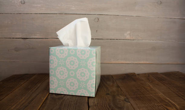 istock a box with napkins on wooden background 1055087410