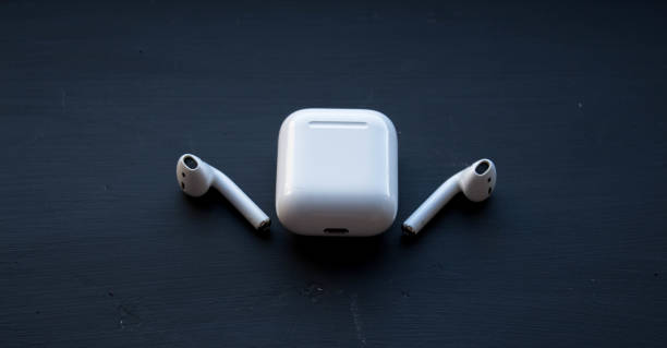 istock a without wired headphones on a black background 1055087730