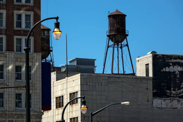 istock Architectural image of buildings and water tanks 1055087880