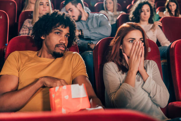 istock Young couple watching a movie together 1055093696