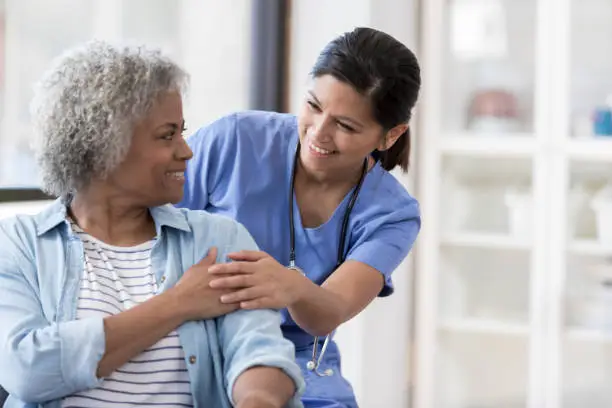 Photo of Nurse with senior patient