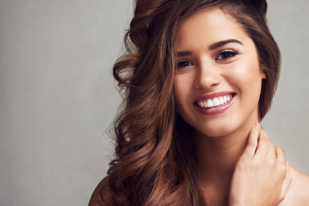 istock Happy when her locks are looking gorgeous 1055098798