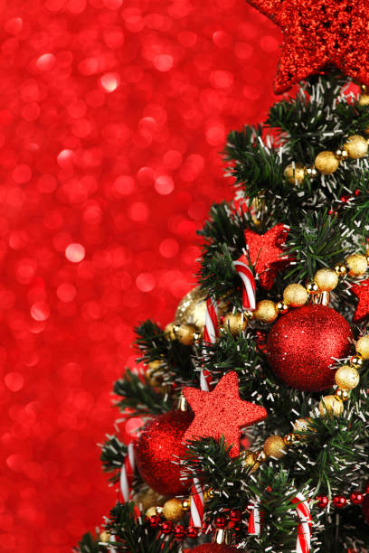 istock Beautiful christmas tree decorated with baubles and candies 1055098888