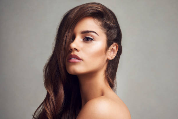 istock Her hair flows and her skin glows 1055098904