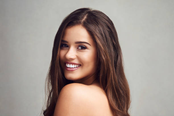 istock Her pretty smile matches her gorgeous hair 1055099012