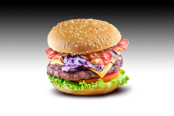 istock Hamburger with cheese salad tomato bacon and coleslaw 1055101924