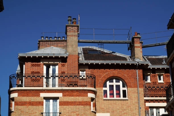 istock paris roofs chimney and building cityview 1055104354